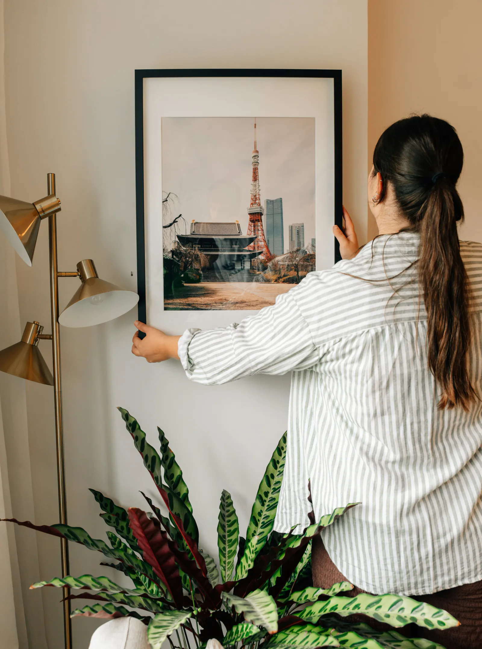 A young adult making a new space feel like home
